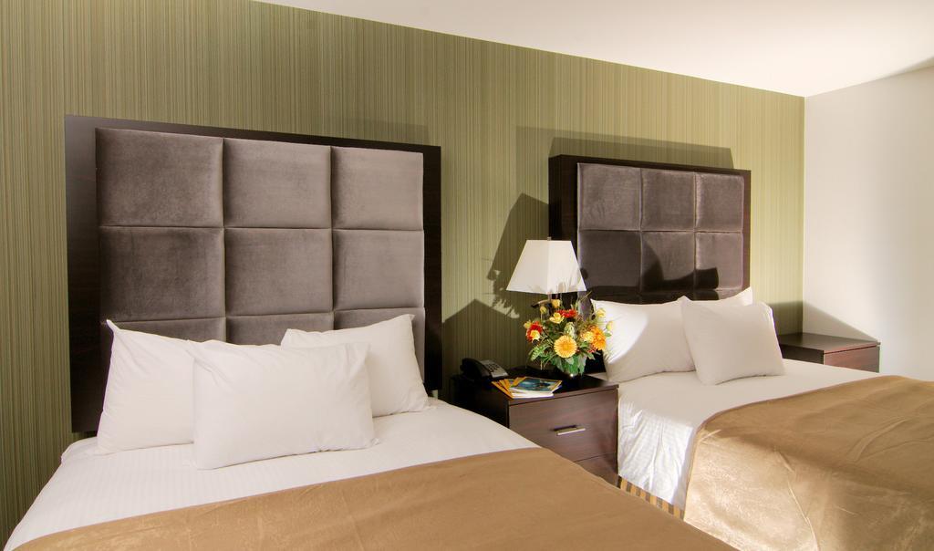 Paradise Inn And Suites Redwater Номер фото